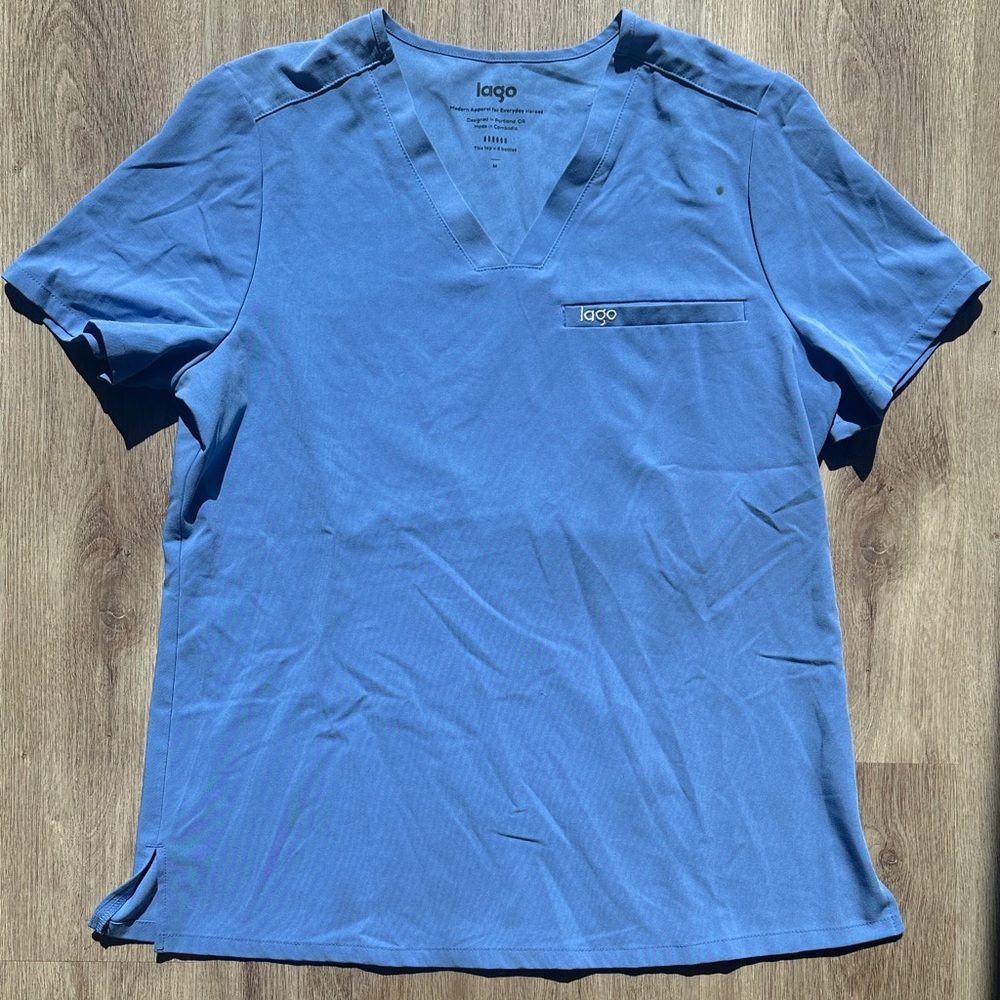 Women’s Lagos scrub top
Size: medium 
Color: ceil blue Small